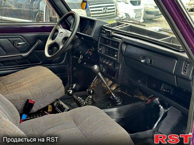 Фиолетовый ВАЗ Нива, объемом двигателя 1.7 л и пробегом 250 тыс. км за 2300 $, фото 4 на Automoto.ua