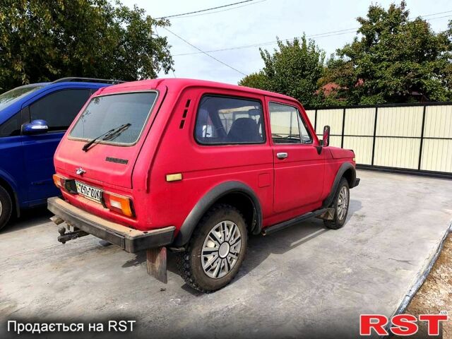 Червоний ВАЗ Нива, об'ємом двигуна 1.6 л та пробігом 100 тис. км за 750 $, фото 1 на Automoto.ua
