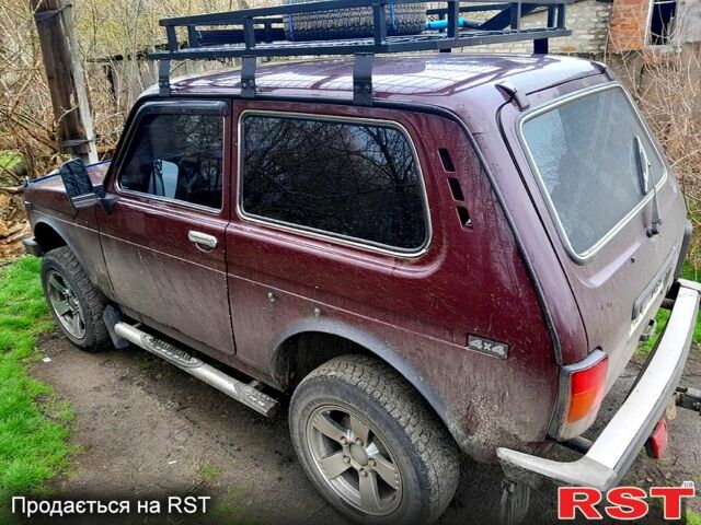 Красный ВАЗ Нива, объемом двигателя 1.6 л и пробегом 170 тыс. км за 2170 $, фото 2 на Automoto.ua