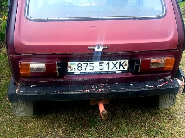 Красный ВАЗ Нива, объемом двигателя 1.6 л и пробегом 300 тыс. км за 1050 $, фото 1 на Automoto.ua