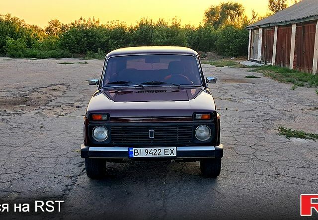 Червоний ВАЗ Нива, об'ємом двигуна 1.6 л та пробігом 237 тис. км за 4000 $, фото 1 на Automoto.ua