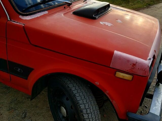 Красный ВАЗ Нива, объемом двигателя 1.6 л и пробегом 135 тыс. км за 1900 $, фото 4 на Automoto.ua