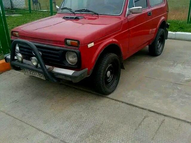Червоний ВАЗ Нива, об'ємом двигуна 1.3 л та пробігом 100 тис. км за 1200 $, фото 5 на Automoto.ua
