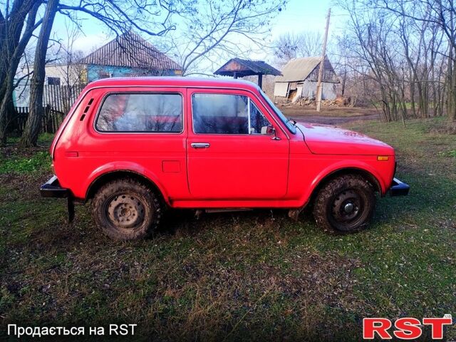 Червоний ВАЗ Нива, об'ємом двигуна 1.6 л та пробігом 150 тис. км за 1500 $, фото 1 на Automoto.ua