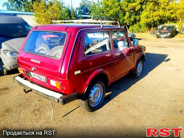 Червоний ВАЗ Нива, об'ємом двигуна 1.6 л та пробігом 215 тис. км за 1150 $, фото 1 на Automoto.ua
