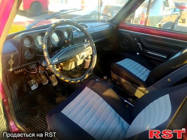 Червоний ВАЗ Нива, об'ємом двигуна 1.6 л та пробігом 215 тис. км за 1150 $, фото 2 на Automoto.ua