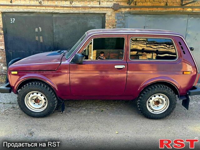 Червоний ВАЗ Нива, об'ємом двигуна 1.7 л та пробігом 170 тис. км за 4200 $, фото 1 на Automoto.ua