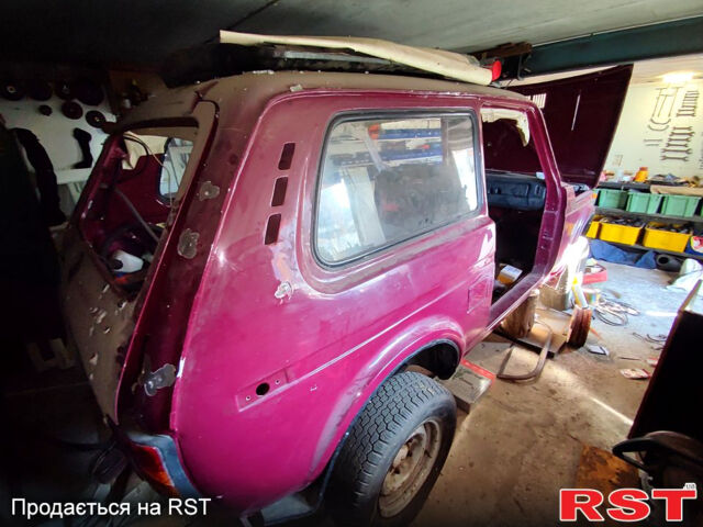 Красный ВАЗ Нива, объемом двигателя 1.7 л и пробегом 62 тыс. км за 1600 $, фото 8 на Automoto.ua