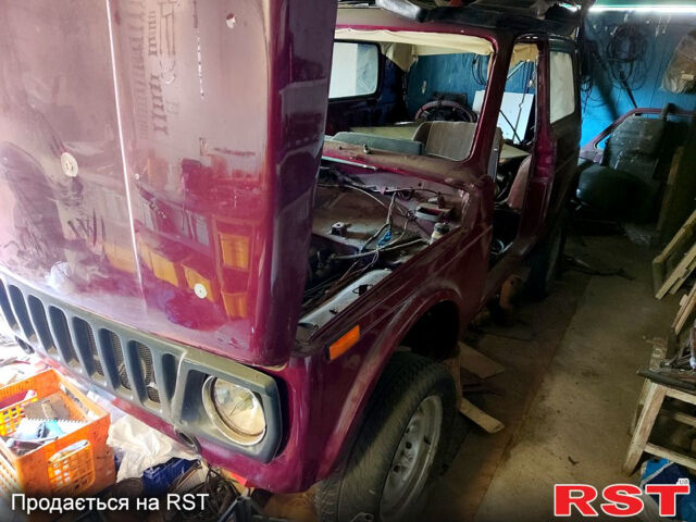 Красный ВАЗ Нива, объемом двигателя 1.7 л и пробегом 62 тыс. км за 1600 $, фото 2 на Automoto.ua