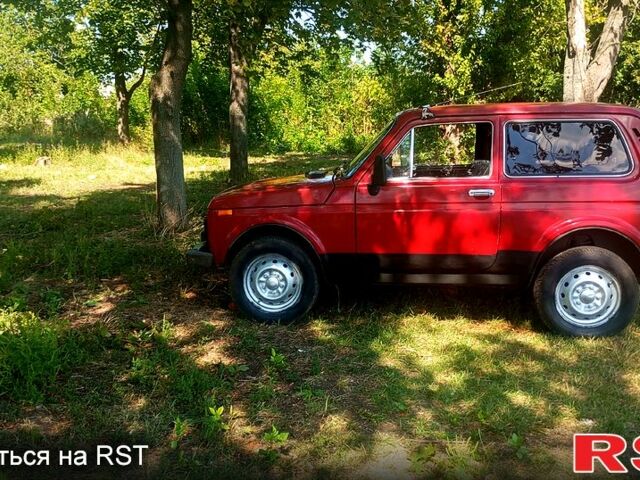 Червоний ВАЗ Нива, об'ємом двигуна 1.7 л та пробігом 111 тис. км за 2000 $, фото 7 на Automoto.ua