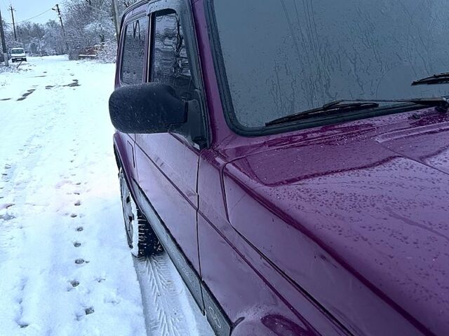 Красный ВАЗ Нива, объемом двигателя 1.7 л и пробегом 200 тыс. км за 3700 $, фото 6 на Automoto.ua