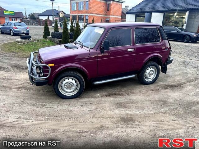 Красный ВАЗ Нива, объемом двигателя 1.7 л и пробегом 130 тыс. км за 3500 $, фото 7 на Automoto.ua