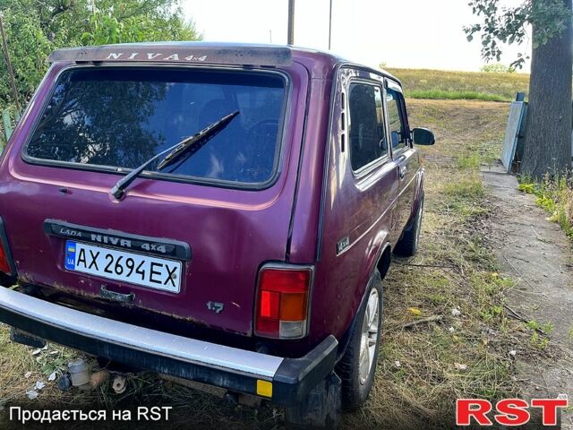 Червоний ВАЗ Нива, об'ємом двигуна 1.7 л та пробігом 150 тис. км за 1500 $, фото 5 на Automoto.ua