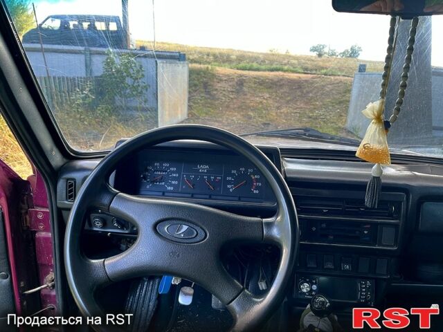 Червоний ВАЗ Нива, об'ємом двигуна 1.7 л та пробігом 150 тис. км за 1500 $, фото 7 на Automoto.ua