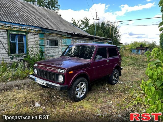 Червоний ВАЗ Нива, об'ємом двигуна 1.7 л та пробігом 150 тис. км за 1500 $, фото 2 на Automoto.ua