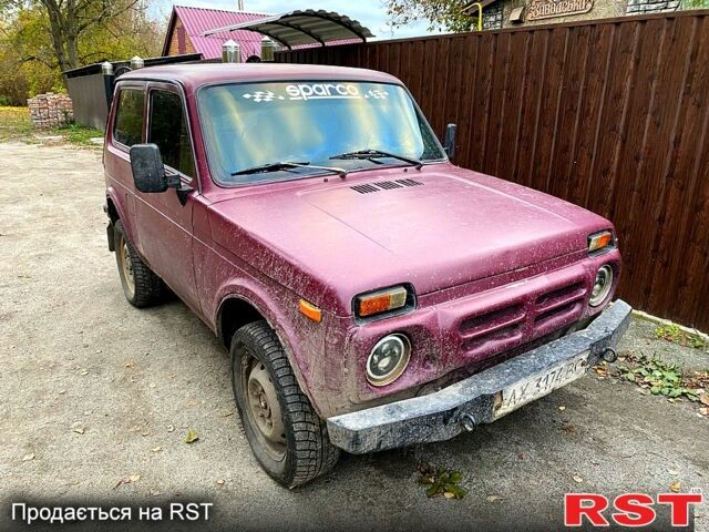 Красный ВАЗ Нива, объемом двигателя 1.7 л и пробегом 126 тыс. км за 1350 $, фото 3 на Automoto.ua
