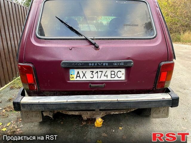 Красный ВАЗ Нива, объемом двигателя 1.7 л и пробегом 126 тыс. км за 1350 $, фото 1 на Automoto.ua