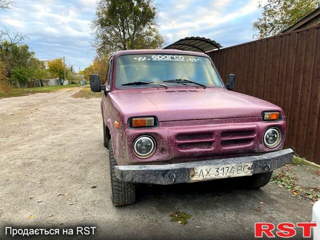 Красный ВАЗ Нива, объемом двигателя 1.7 л и пробегом 126 тыс. км за 1350 $, фото 5 на Automoto.ua