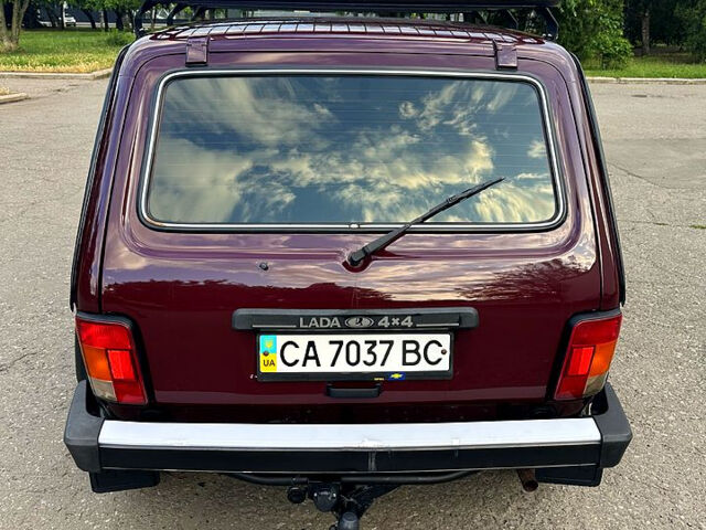 Красный ВАЗ Нива, объемом двигателя 1.7 л и пробегом 49 тыс. км за 6500 $, фото 4 на Automoto.ua