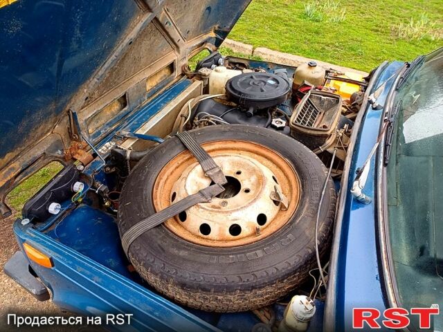 Синий ВАЗ Нива, объемом двигателя 1.7 л и пробегом 186 тыс. км за 3200 $, фото 7 на Automoto.ua