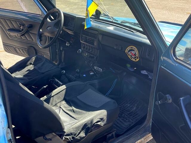 Синій ВАЗ Нива, об'ємом двигуна 1.7 л та пробігом 228 тис. км за 1900 $, фото 4 на Automoto.ua