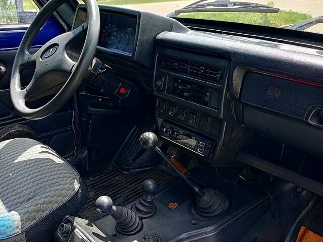 Синий ВАЗ Нива, объемом двигателя 1.7 л и пробегом 150 тыс. км за 2900 $, фото 6 на Automoto.ua