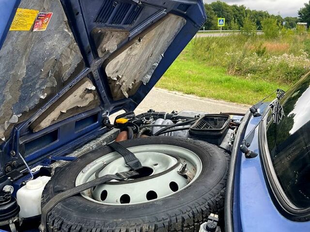 Синій ВАЗ Нива, об'ємом двигуна 1.7 л та пробігом 258 тис. км за 5200 $, фото 4 на Automoto.ua