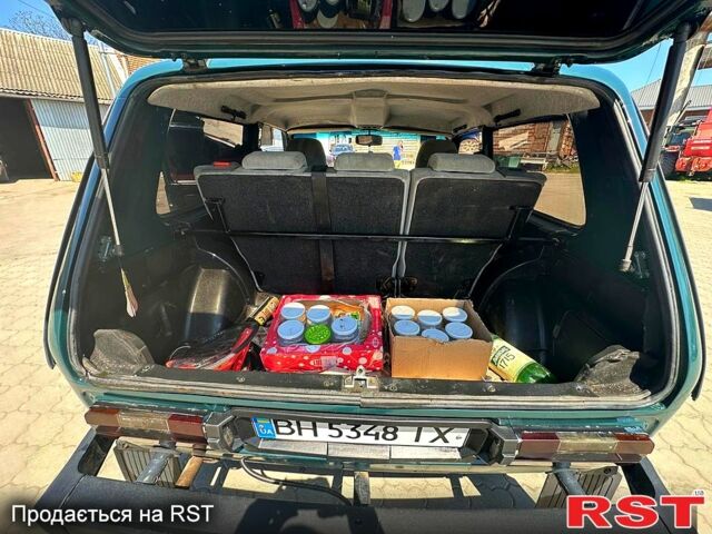 Зелений ВАЗ Нива, об'ємом двигуна 1.6 л та пробігом 50 тис. км за 3700 $, фото 2 на Automoto.ua