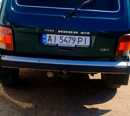 Зеленый ВАЗ Нива, объемом двигателя 1.6 л и пробегом 230 тыс. км за 2800 $, фото 4 на Automoto.ua
