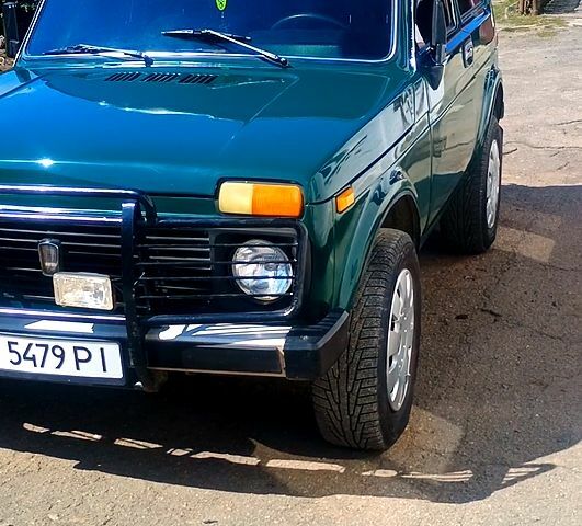 Зеленый ВАЗ Нива, объемом двигателя 1.6 л и пробегом 230 тыс. км за 2800 $, фото 5 на Automoto.ua