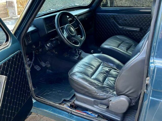 Зеленый ВАЗ Нива, объемом двигателя 1.6 л и пробегом 111 тыс. км за 3300 $, фото 6 на Automoto.ua