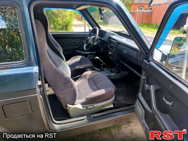 Зеленый ВАЗ Нива, объемом двигателя 1.7 л и пробегом 275 тыс. км за 1500 $, фото 11 на Automoto.ua