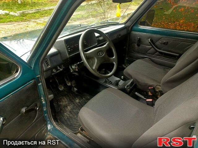 Зеленый ВАЗ Нива, объемом двигателя 1.7 л и пробегом 186 тыс. км за 3000 $, фото 2 на Automoto.ua