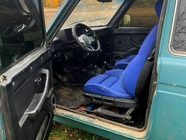 Зеленый ВАЗ Нива, объемом двигателя 1.7 л и пробегом 235 тыс. км за 2700 $, фото 6 на Automoto.ua