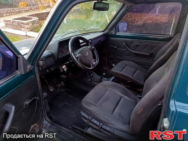 Зелений ВАЗ Нива, об'ємом двигуна 1.7 л та пробігом 186 тис. км за 3000 $, фото 2 на Automoto.ua