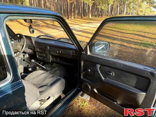Зеленый ВАЗ Нива, объемом двигателя 1.7 л и пробегом 208 тыс. км за 3300 $, фото 8 на Automoto.ua
