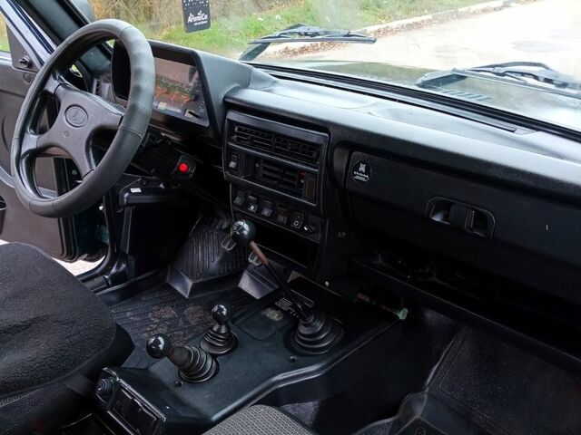 Зеленый ВАЗ Нива, объемом двигателя 1.7 л и пробегом 322 тыс. км за 3600 $, фото 3 на Automoto.ua