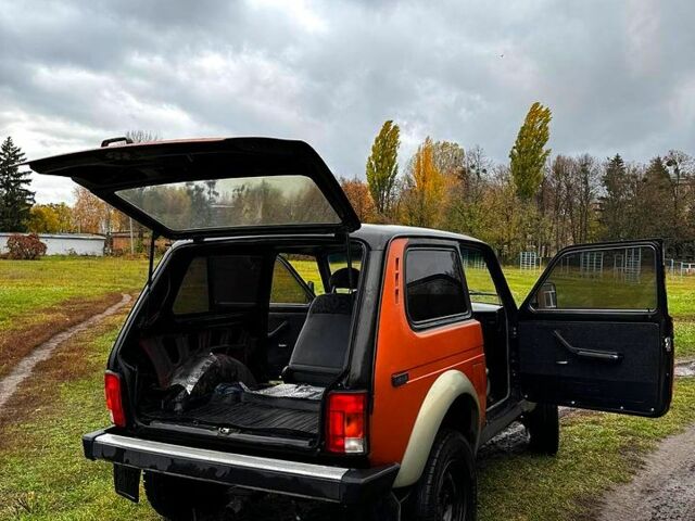 Оранжевый ВАЗ Нива, объемом двигателя 1.6 л и пробегом 300 тыс. км за 1999 $, фото 8 на Automoto.ua