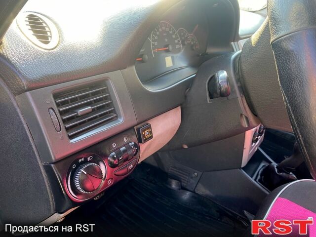 Чорний ВАЗ Priora, об'ємом двигуна 1.6 л та пробігом 134 тис. км за 2000 $, фото 8 на Automoto.ua