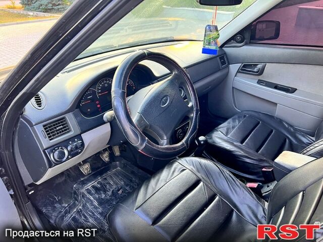 Черный ВАЗ Priora, объемом двигателя 1.6 л и пробегом 200 тыс. км за 2200 $, фото 6 на Automoto.ua