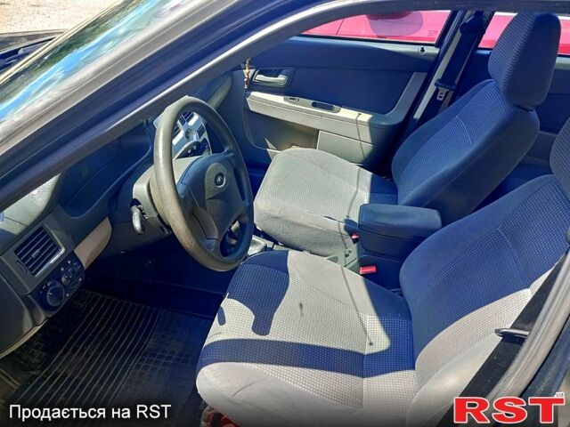 Черный ВАЗ Priora, объемом двигателя 1.6 л и пробегом 162 тыс. км за 2500 $, фото 4 на Automoto.ua