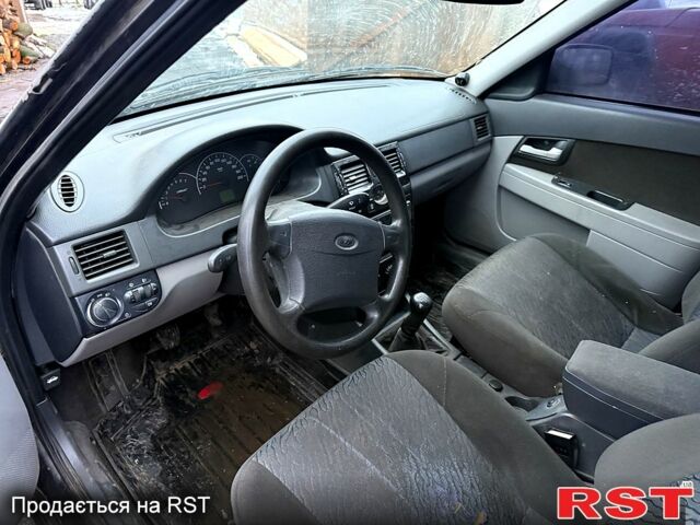 Черный ВАЗ Priora, объемом двигателя 1.6 л и пробегом 150 тыс. км за 1450 $, фото 6 на Automoto.ua