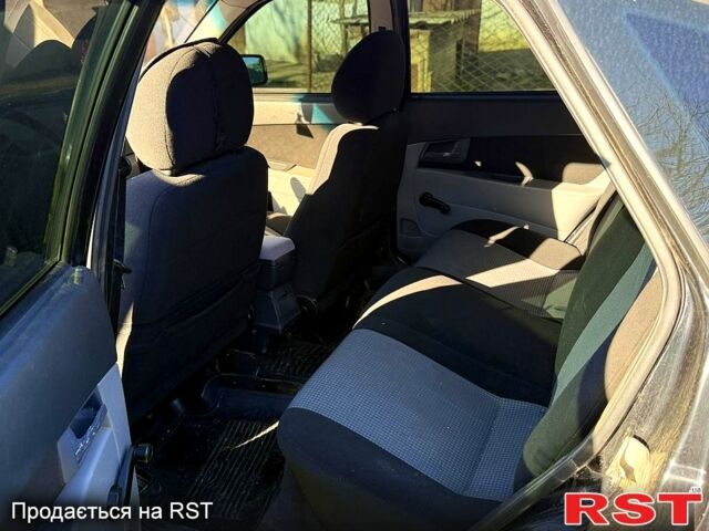 Черный ВАЗ Priora, объемом двигателя 1.6 л и пробегом 110 тыс. км за 2400 $, фото 5 на Automoto.ua