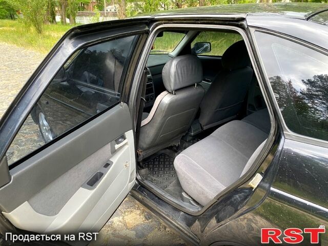 Черный ВАЗ Priora, объемом двигателя 1.6 л и пробегом 194 тыс. км за 2450 $, фото 7 на Automoto.ua