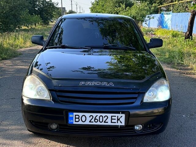 Черный ВАЗ Priora, объемом двигателя 1.6 л и пробегом 174 тыс. км за 2550 $, фото 1 на Automoto.ua