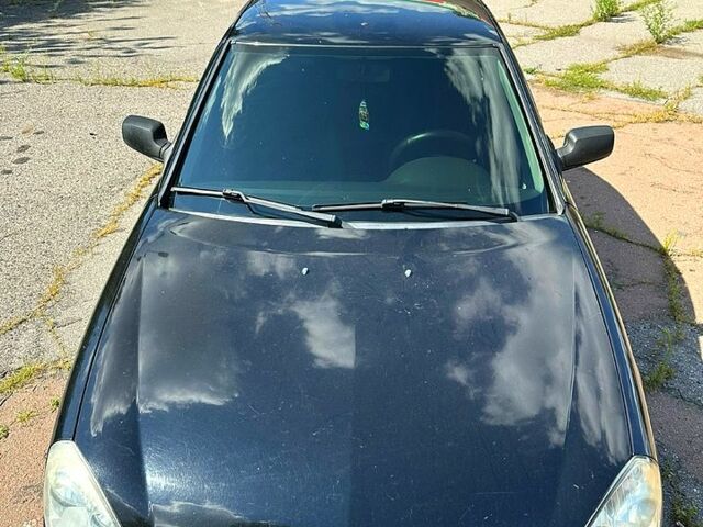 Черный ВАЗ Priora, объемом двигателя 1.6 л и пробегом 190 тыс. км за 2700 $, фото 1 на Automoto.ua