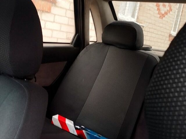 Черный ВАЗ Priora, объемом двигателя 1.6 л и пробегом 330 тыс. км за 2400 $, фото 1 на Automoto.ua