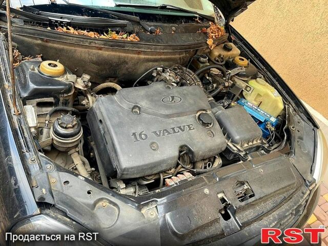 Черный ВАЗ Priora, объемом двигателя 1.6 л и пробегом 253 тыс. км за 1999 $, фото 10 на Automoto.ua