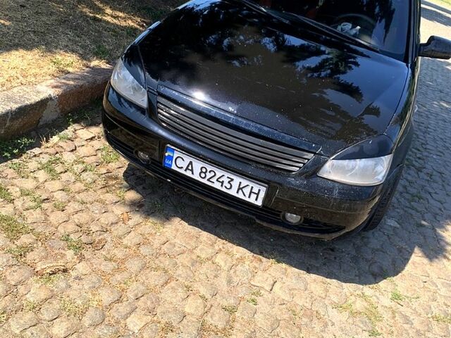 Черный ВАЗ Priora, объемом двигателя 1.6 л и пробегом 250 тыс. км за 2200 $, фото 2 на Automoto.ua