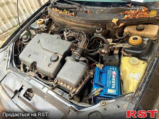 Черный ВАЗ Priora, объемом двигателя 1.6 л и пробегом 253 тыс. км за 1999 $, фото 9 на Automoto.ua